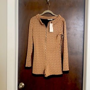 This Romper is super cute . Brand new with tags